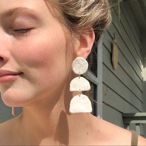 White tiered earrings